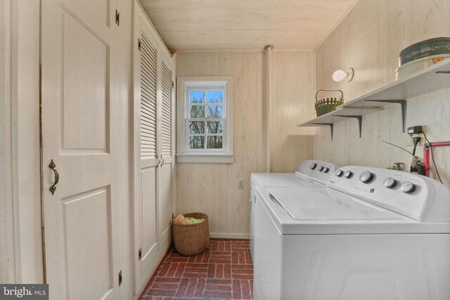 412 Nelmonte Ln, Arrington, VA 22922 - laundry room featuring brick flooring, independent washer and dryer, wood ceiling, baseboards, and wood walls