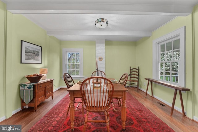 412 Nelmonte Ln, Arrington, VA 22922 - dining area with beam ceiling, wood finished floors, and baseboards