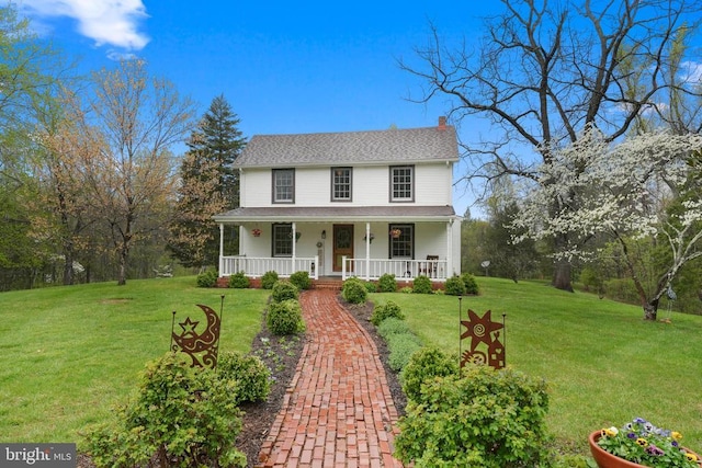 412 Nelmonte Ln, Arrington, VA 22922 - view of front facade featuring a chimney, covered porch, a front yard, and a shingled roof