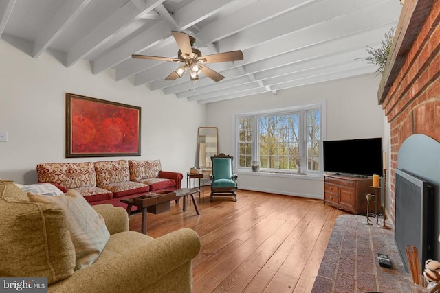 412 Nelmonte Ln, Arrington, VA 22922 - living room with beamed ceiling, ceiling fan, light wood-style flooring, and baseboards
