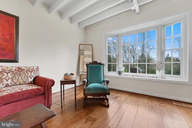 412 Nelmonte Ln, Arrington, VA 22922 - living area featuring beamed ceiling, wood-type flooring, and baseboards