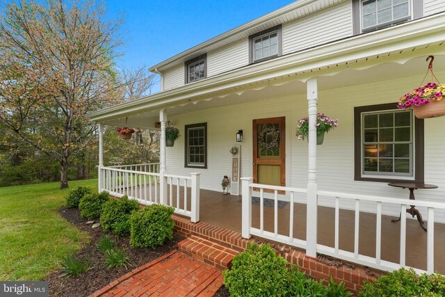 412 Nelmonte Ln, Arrington, VA 22922 - doorway to property with a porch and a lawn