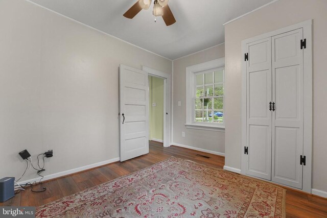 412 Nelmonte Ln, Arrington, VA 22922 - unfurnished bedroom featuring wood finished floors, baseboards, and ceiling fan