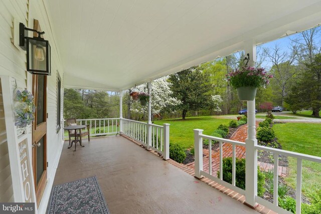 412 Nelmonte Ln, Arrington, VA 22922 - view of patio / terrace with covered porch and view of wooded area
