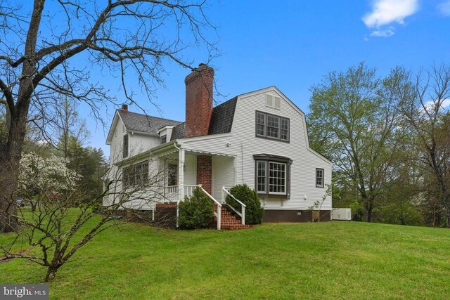 412 Nelmonte Ln, Arrington, VA 22922 - back of house with a lawn, a chimney, a gambrel roof, and roof with shingles