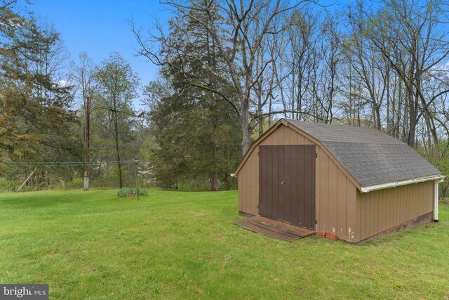 412 Nelmonte Ln, Arrington, VA 22922 - view of green lawn featuring a shed and an outbuilding