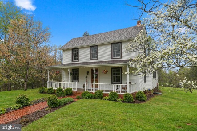 412 Nelmonte Ln, Arrington, VA 22922 - country-style home with a chimney, a porch, and a front yard