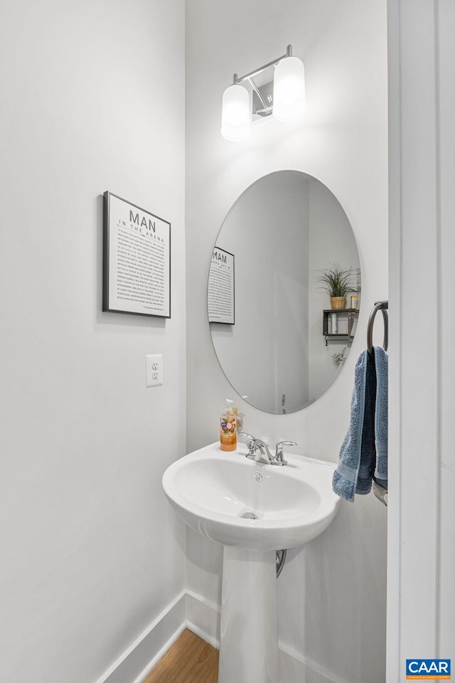 1802 Flora Ln, Charlottesville, VA 22911 - bathroom featuring baseboards and wood finished floors