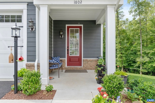 1802 Flora Ln, Charlottesville, VA 22911 - entrance to property with covered porch and brick siding