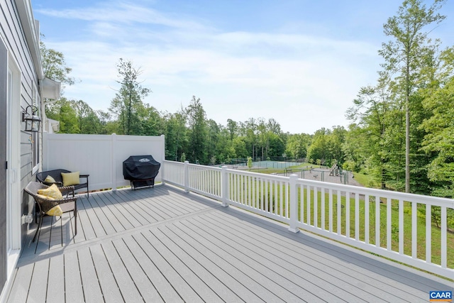 1802 Flora Ln, Charlottesville, VA 22911 - wooden terrace featuring a grill and a fenced backyard