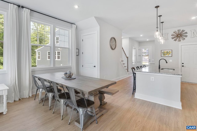 1802 Flora Ln, Charlottesville, VA 22911 - dining space with stairway, light wood-style flooring, and recessed lighting