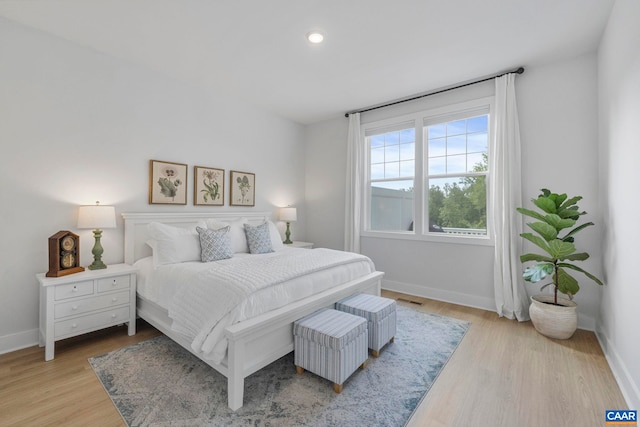 1802 Flora Ln, Charlottesville, VA 22911 - bedroom with wood finished floors and recessed lighting