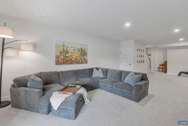 1802 Flora Ln, Charlottesville, VA 22911 - living area featuring carpet flooring, stairway, and recessed lighting