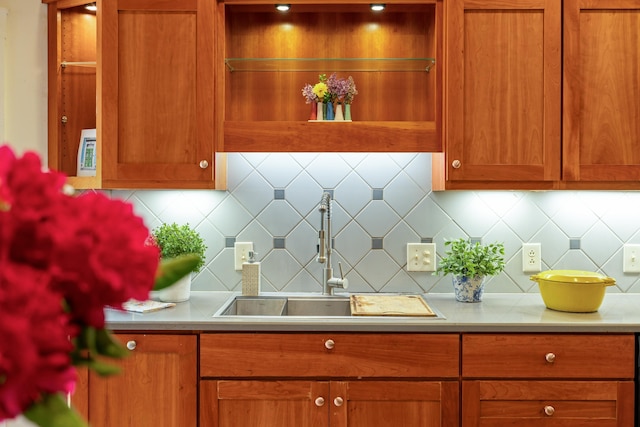 7598 Lee Hwy N, Raphine, VA 24472 - kitchen with a sink, light countertops, and decorative backsplash