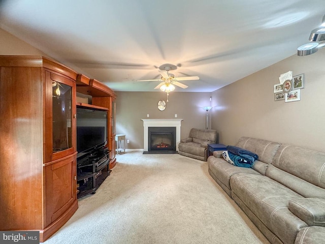 108 Apple Orchard Rd, Louisa, VA 23093 - living room with light colored carpet, a ceiling fan, and a fireplace with flush hearth