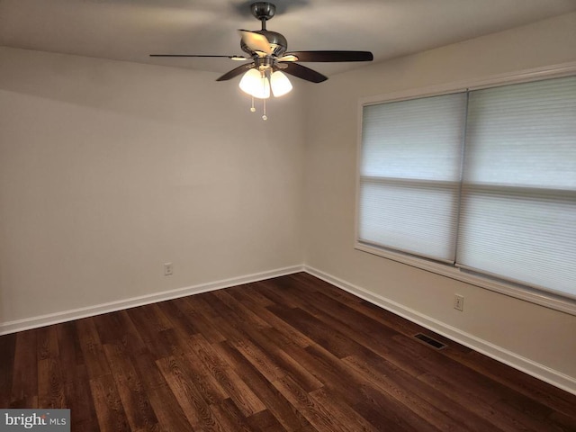 10703 Redbird Ln, Spotsylvania, VA 22553 - empty room featuring dark wood-style flooring and ceiling fan