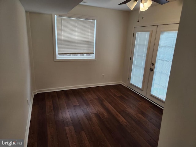 10703 Redbird Ln, Spotsylvania, VA 22553 - spare room featuring french doors, dark wood-style floors, a ceiling fan, and baseboards