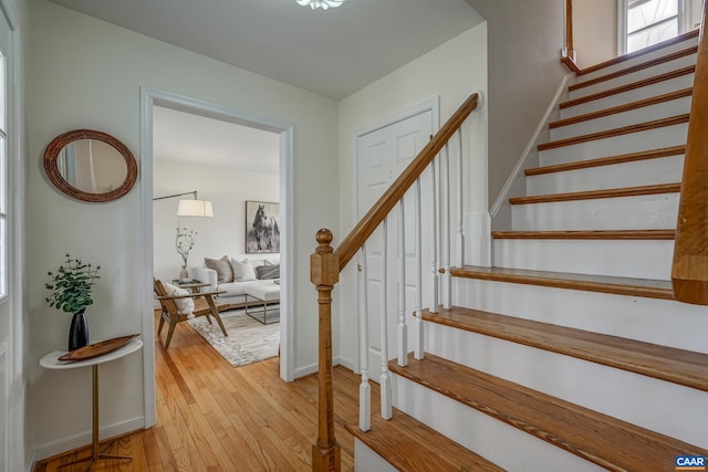 3595 Jumpers Ridge Rd, Keswick, VA 22947 - stairs with baseboards and wood-type flooring
