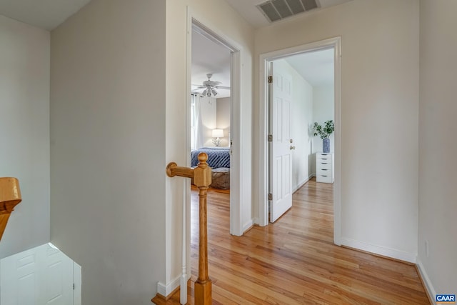 3595 Jumpers Ridge Rd, Keswick, VA 22947 - corridor with light wood-type flooring, visible vents, and baseboards