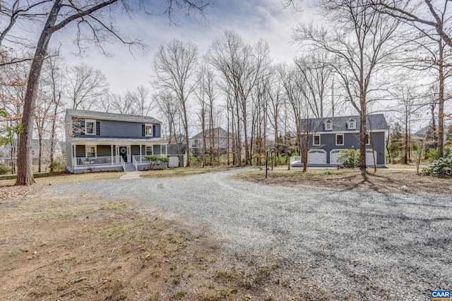 3595 Jumpers Ridge Rd, Keswick, VA 22947 - view of front of property with a porch and gravel driveway
