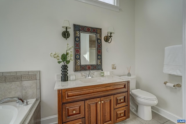 3595 Jumpers Ridge Rd, Keswick, VA 22947 - full bathroom featuring a garden tub, toilet, tile patterned floors, baseboards, and vanity
