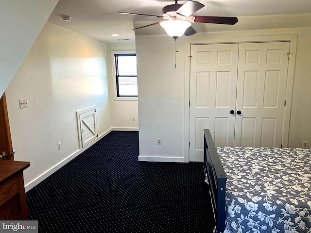 26536 Pennfields Dr, Orange, VA 22960 - unfurnished bedroom with dark colored carpet, baseboards, a ceiling fan, and a closet
