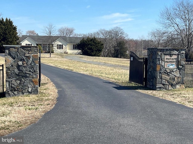 26536 Pennfields Dr, Orange, VA 22960 - view of asphalt driveway featuring a gate