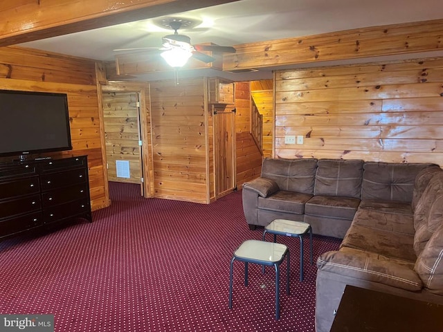 26536 Pennfields Dr, Orange, VA 22960 - living area with ceiling fan, wooden walls, and carpet