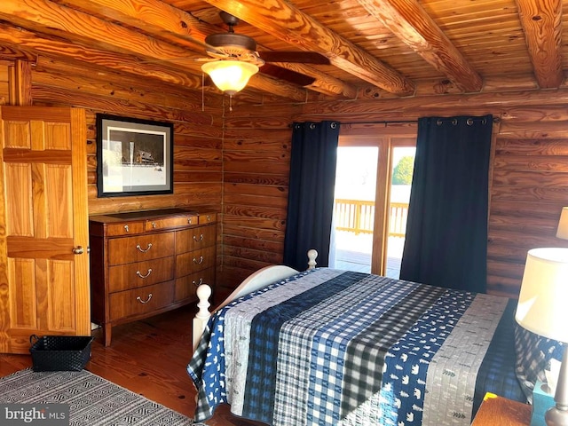 26536 Pennfields Dr, Orange, VA 22960 - bedroom featuring wood finished floors, beamed ceiling, access to exterior, wood ceiling, and rustic walls