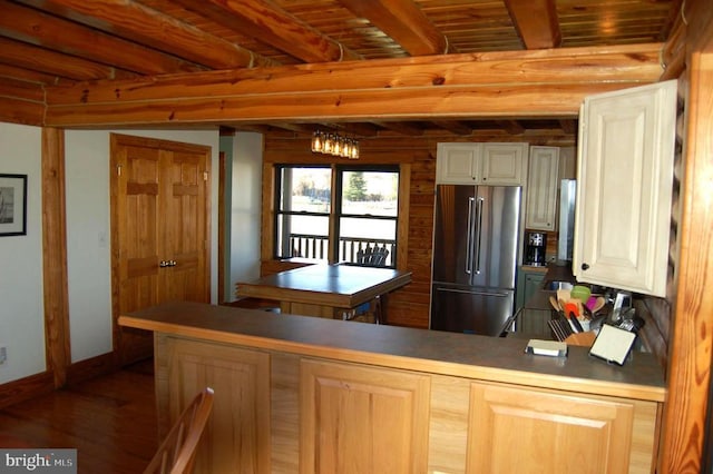 26536 Pennfields Dr, Orange, VA 22960 - kitchen with high end fridge, wood finished floors, beam ceiling, baseboards, and a peninsula