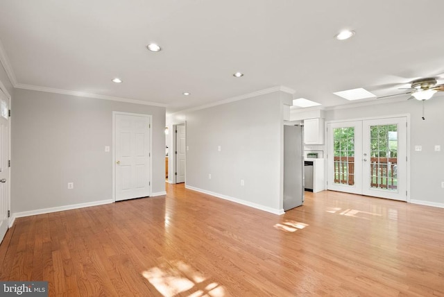 6314 Foster Rd, Spotsylvania, VA 22553 - unfurnished living room featuring crown molding, a skylight, ceiling fan, recessed lighting, and baseboards