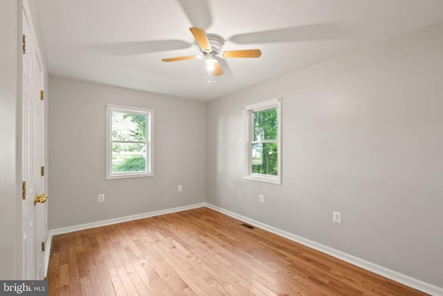 6314 Foster Rd, Spotsylvania, VA 22553 - unfurnished room with healthy amount of natural light, baseboards, light wood finished floors, and a ceiling fan