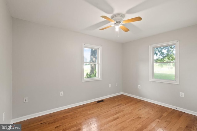 6314 Foster Rd, Spotsylvania, VA 22553 - spare room featuring healthy amount of natural light, light wood-style floors, ceiling fan, and baseboards