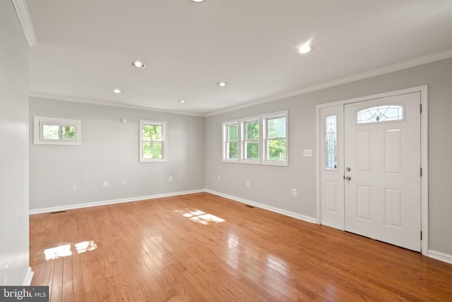 6314 Foster Rd, Spotsylvania, VA 22553 - entryway with crown molding, light wood-type flooring, baseboards, and recessed lighting