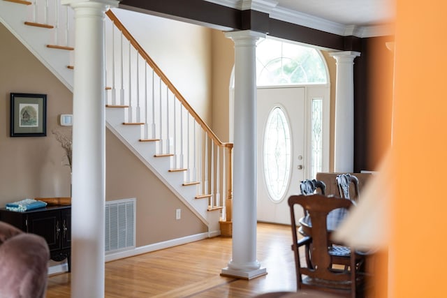 31 Hampton Dr, Stuarts Draft, VA 24477 - entrance foyer featuring decorative columns, wood finished floors, stairs, and crown molding