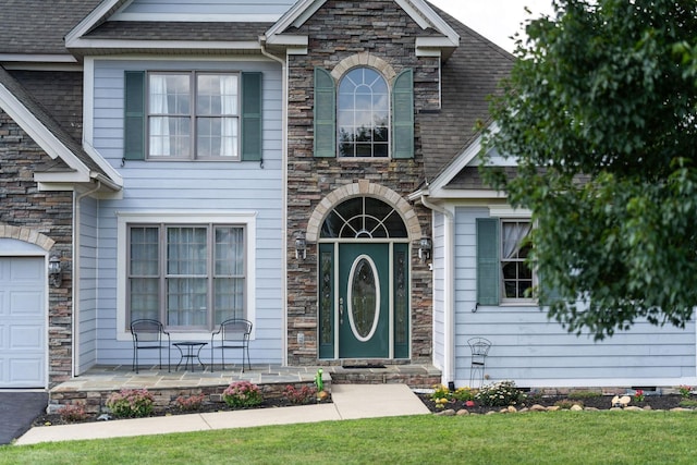 31 Hampton Dr, Stuarts Draft, VA 24477 - craftsman inspired home featuring stone siding, a front lawn, and a shingled roof