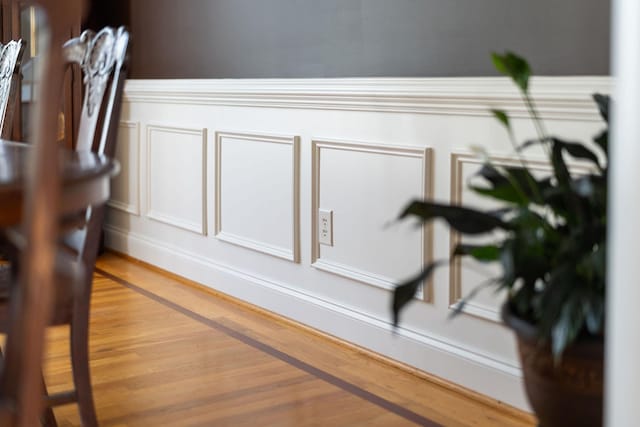 31 Hampton Dr, Stuarts Draft, VA 24477 - detailed view of wood finished floors, a decorative wall, and a wainscoted wall