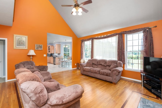 31 Hampton Dr, Stuarts Draft, VA 24477 - living room with light wood finished floors, ceiling fan, and high vaulted ceiling
