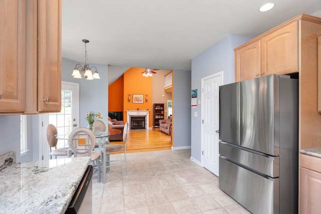 31 Hampton Dr, Stuarts Draft, VA 24477 - kitchen with appliances with stainless steel finishes, a ceiling fan, light brown cabinetry, and light stone counters