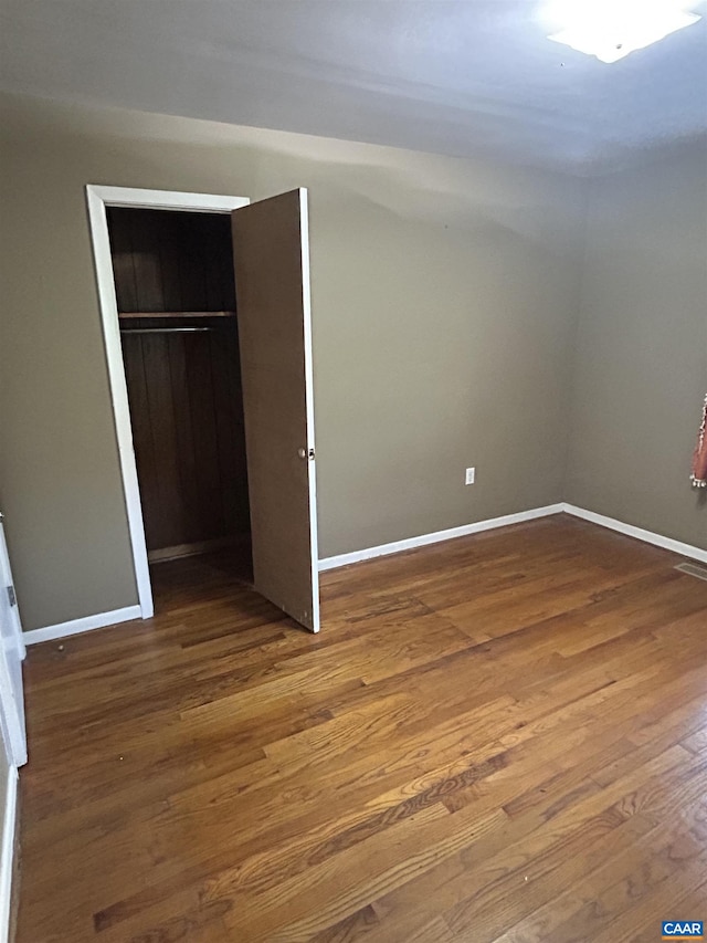 1863 River Rd, Faber, VA 22938 - unfurnished bedroom with wood finished floors and a closet