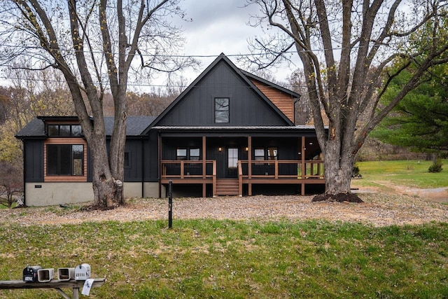 3332 Hill Gap Rd, Bridgewater, VA 22812 - view of front of property featuring covered porch, board and batten siding, and a front yard