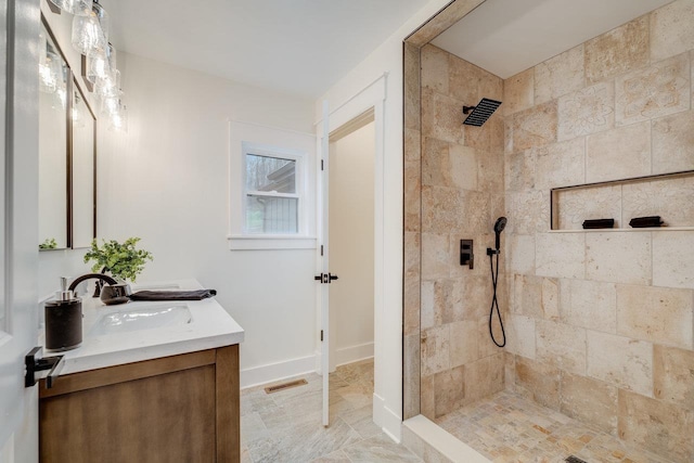 3332 Hill Gap Rd, Bridgewater, VA 22812 - bathroom with a sink, visible vents, double vanity, baseboards, and a tile shower