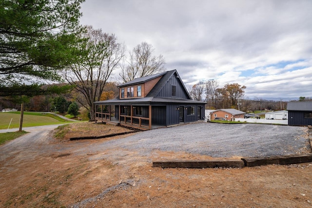 3332 Hill Gap Rd, Bridgewater, VA 22812 - view of front of home with gravel driveway, board and batten siding, and covered porch