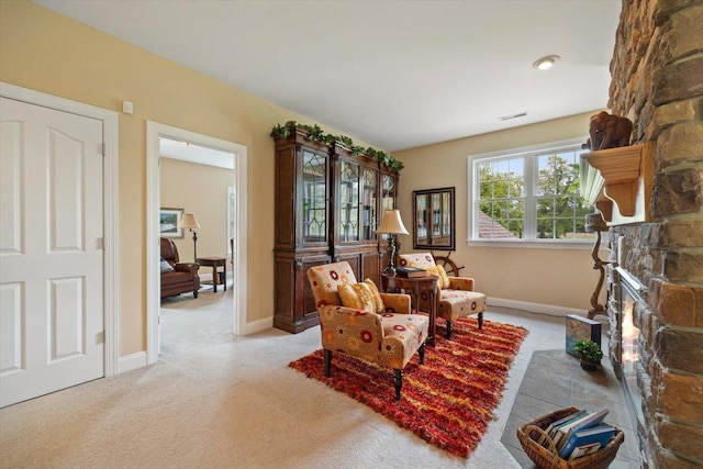 515 Legrande Ave, Waynesboro, VA 22980 - sitting room with light carpet and a stone fireplace