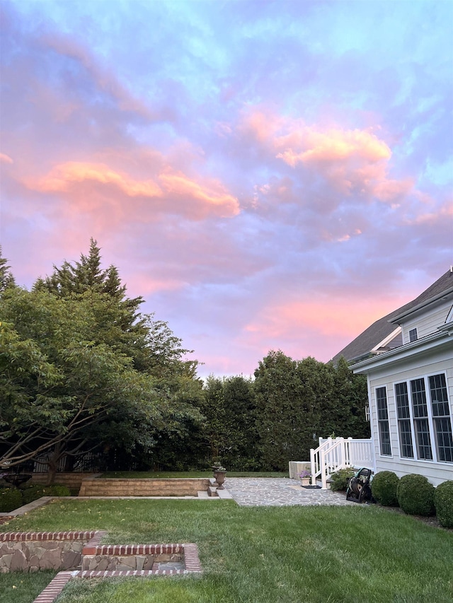 515 Legrande Ave, Waynesboro, VA 22980 - yard at dusk featuring a lawn