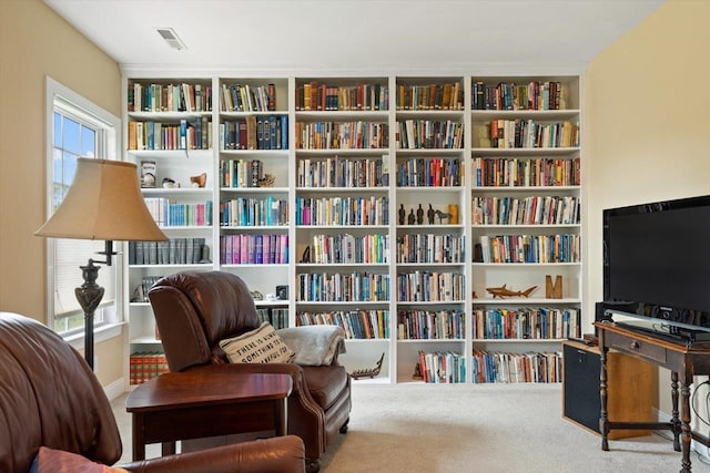 515 Legrande Ave, Waynesboro, VA 22980 - sitting room with wall of books and carpet floors