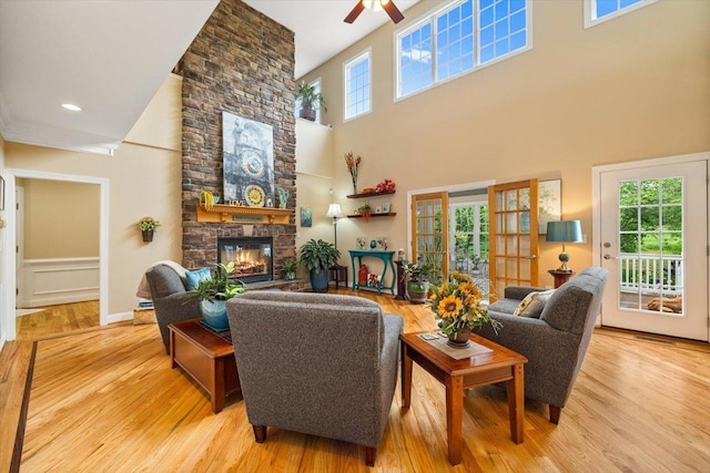 515 Legrande Ave, Waynesboro, VA 22980 - living area with a towering ceiling, a fireplace, wood finished floors, and a ceiling fan