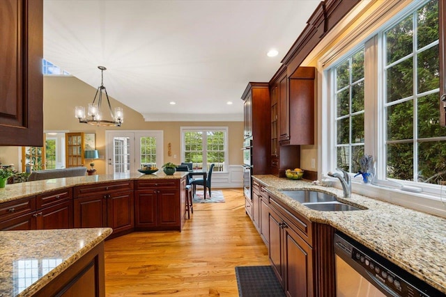 515 Legrande Ave, Waynesboro, VA 22980 - kitchen featuring stainless steel dishwasher, light wood-type flooring, pendant lighting, light stone countertops, and a chandelier