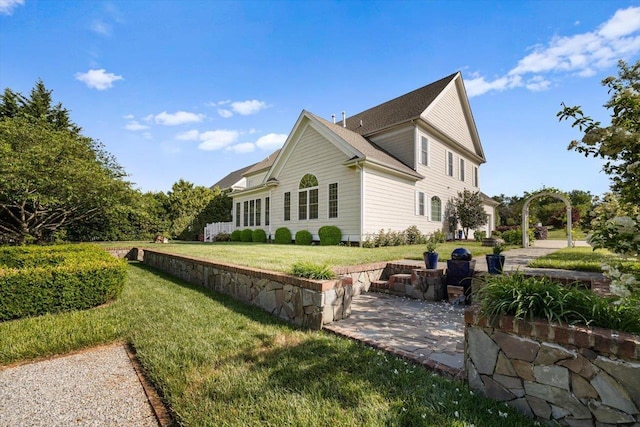 515 Legrande Ave, Waynesboro, VA 22980 - view of side of property featuring a lawn and a patio area