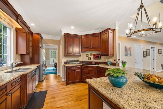515 Legrande Ave, Waynesboro, VA 22980 - kitchen featuring crown molding, a chandelier, light wood-type flooring, plenty of natural light, and freestanding refrigerator